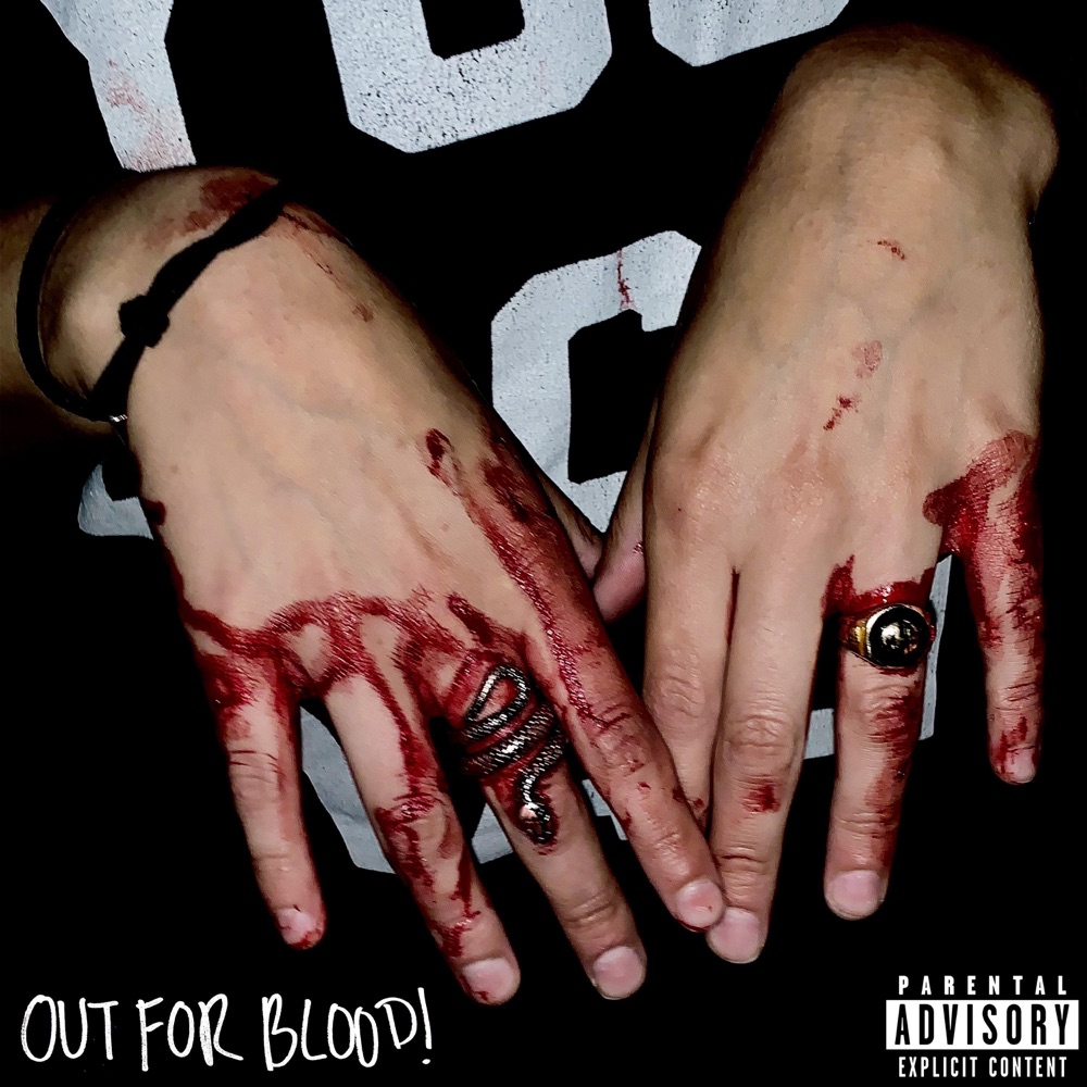 Out For Blood cover: ringed hands with theatrical blood against black fabric